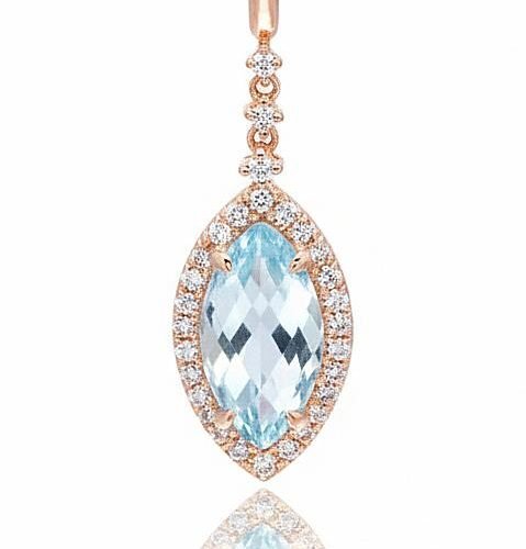 Gold pendant with Diamonds , Sky Blue Topaz