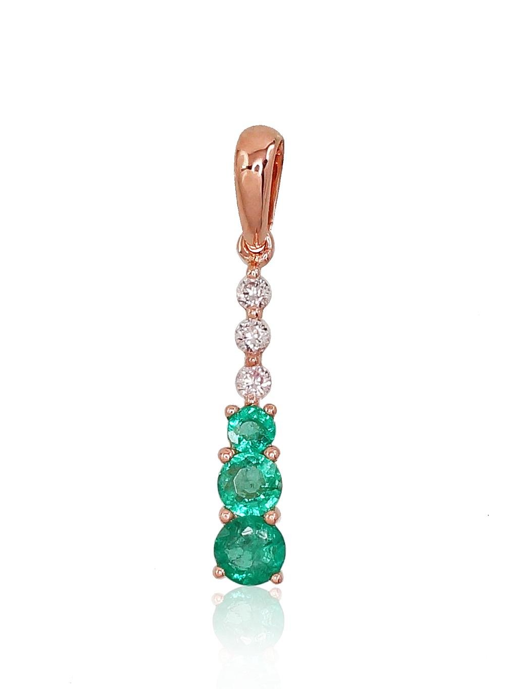 Gold pendant with Diamonds , Emerald