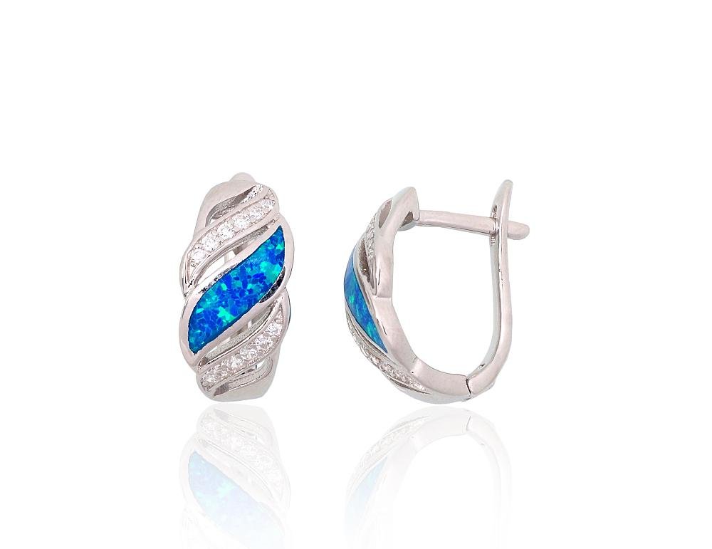 Silver stud earrings with Zirkons , Opalit