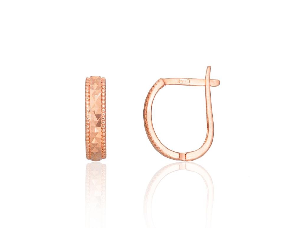 Gold earrings with 'english' lock
