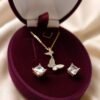 925 sterling silver butterfly pendant and earrings set with mother of pearl and cubic zirconia in rose gold plating.
