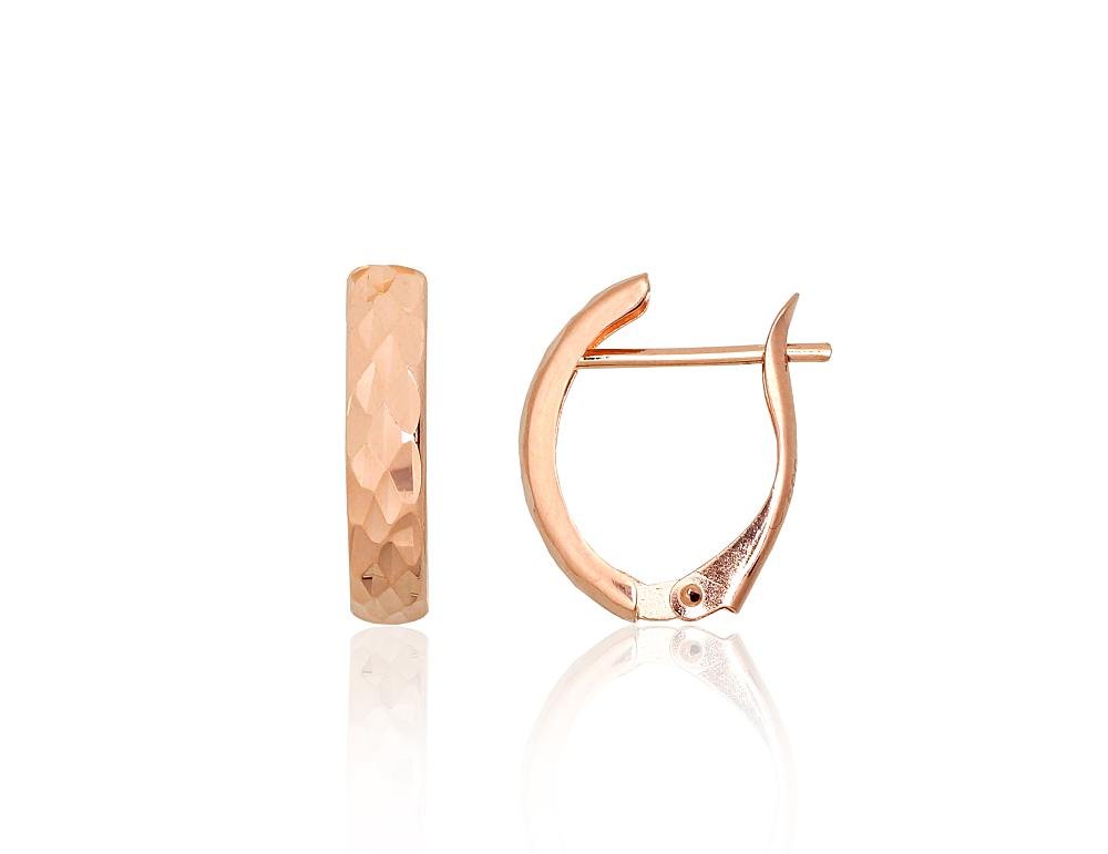 Gold earrings with 'english' lock